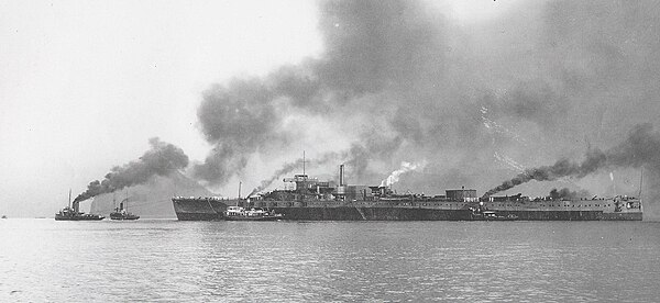 Tosa, partly complete, being towed from Nagasaki in 1922