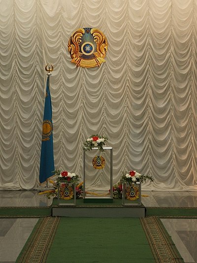 Ballot boxes, Kazakh flag and state seal in an Astana polling place before the 2007 legislative elections.