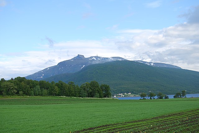 View from Gibostad village on Senja island towards Kistefjellet mountain on the mainland