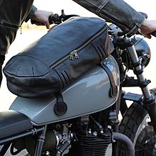 A tank bag held to the gas tank with magnetic fasteners Leather tank bag produced by Oaks & Phoenix Denmark - Oct 2018.jpg