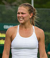 Marina Melnikova competing in the first round of the 2015 Wimbledon Qualifying Tournament at the Bank of England Sports Grounds in Roehampton, England. The winners of three rounds of competition qualify for the main draw of Wimbledon the following week.