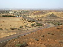 The Massawa-Asmara Highway, built as part of the Wefri Warsay Yika'alo program. Massawa Highway (8527952867).jpg