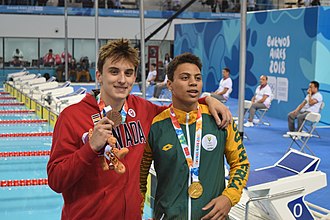 Michael Houlie, South Africa, and Alexander Milanovich, Canada, present their gold respective bronze medal Men's 50m Breaststroke Final YOG18 12-10-2018 (15).jpg