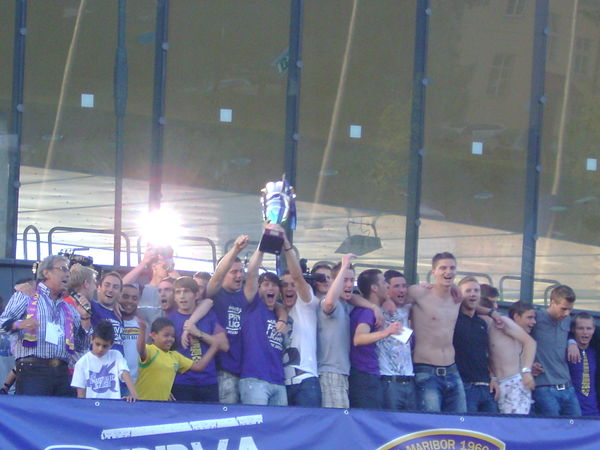 PrvaLiga trophy being lifted in celebration of Maribor's ninth league title in May 2011.