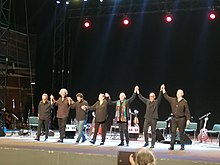 La Nuova Compagnia di Canto Popolare in concerto presso la cavea esterna dell'Auditorium Parco della Musica (2021); ringraziamenti finali