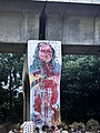 Large portrait of Hasina at Dhaka University splatted with red colour