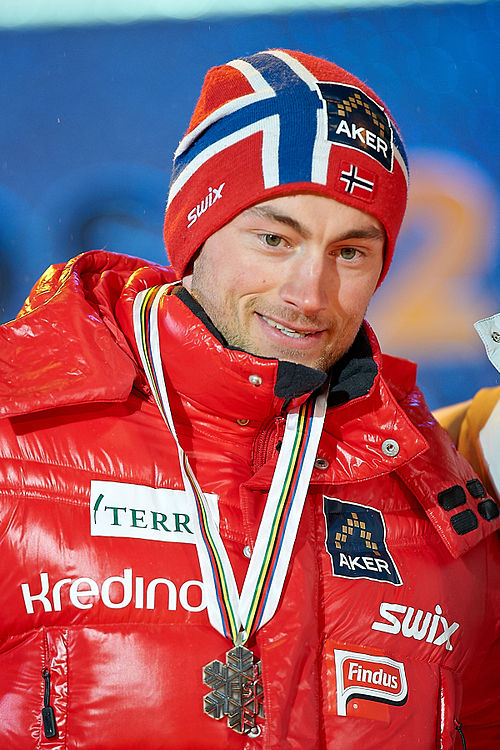 Petter Northug receiving his silver medal after the men's sprint