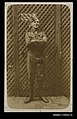 Photographic postcard of a man dressed in military clothing (10198027483).jpg