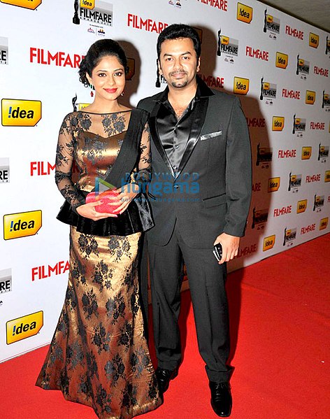 Indrajith with wife Poornima Indrajith at 60th Filmfare Awards South