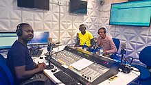 Presenter Okot and guests in the Radio station. Presenter Okot and Guests in the Radio station.jpg