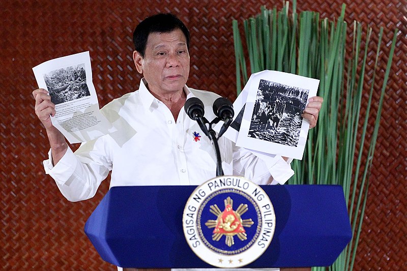 File:President Rodrigo Duterte shows to his new appointees pictures of the Bud Dajo Massacre 02.jpg