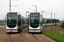 The two generations of Alstom Citadis trams; the older one is on the left and the newer on the right RET 2108 Citadis Barendrecht Carnisselande 2.jpg