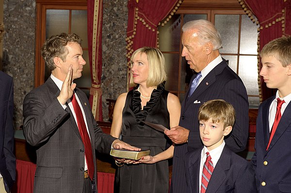 Paul being sworn in as a senator by Vice President Joe Biden, along with his family, in the Old Senate Chamber in the U.S. Capitol, January 2011