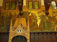 Stadhuis St. Johann, schilderij in de balzaal van het stadhuis: St. Arnulf von Metz wijdt de eerste kapel van St. Johann Graaf Johann I van Saarbrücken overhandigt de vrijheidsbrief van 1322