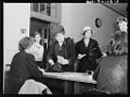 Ration book applicants checking out at Woodrow Wilson High 8d41116v.jpg