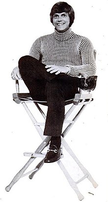 Publicity photo of Richard Carpenter sitting in a chair, 1973