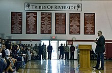 Secretary of the Interior Zinke addressing the school in the gymnasium in 2018 Riverside Indian School Assembly.jpg