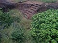 Rockcut steps to a large cistern pavurallakonda Bheemunipatnam.jpg