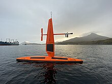 A saildrone is recovered in Dutch Harbor, AK, after the 2019 NOAA Arctic missions. Saildrone in 2019 NOAA Arctic mission.jpg