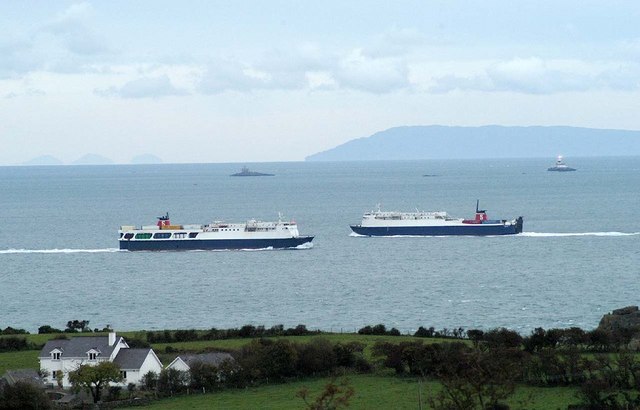 Photograph looking north from Islandmagee illustrating the proximity to Scotland. In the foreground is Islandmagee in Northern Ireland, followed by St