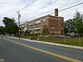 Saint Margaret's School, located at 486 Stevens Street, Lowell, Massachusetts. South and west (front) sides of building shown.