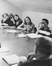 Student raising a point in a Shimer College class, 1967 Shimer class Recondite 67 2.jpg