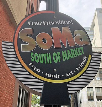 SoMA tanda yang tergantung di Mall Street Market Street