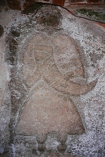 A priest of Svantevit depicted on a stone from Arkona, now in the church of Altenkirchen