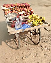 A fruit seller's customized mobile stall in India Street vendor's mobile stall in India.jpg