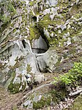 Thumbnail for File:TJØME Norway Øvre Barkevik Rødskogen. Giant's kettle pothole in glacial eroded rock of smooth granite, ca 1 meter wide, in forest (Jettegryte i mosekledt svaberg i granitt i skogen) 2021-05-16 IMG 0036.jpg