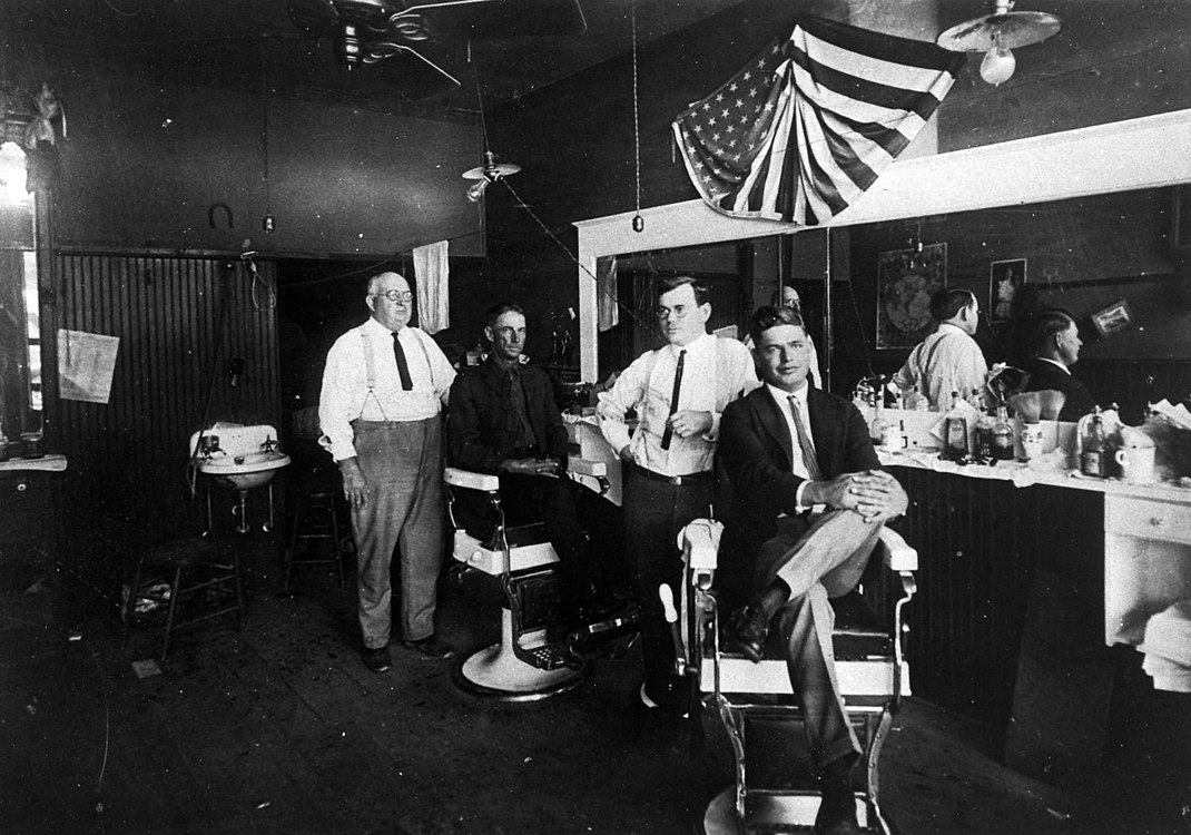 Interior of a barber's shop, circa 1920