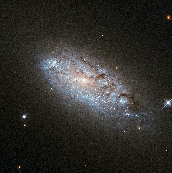 The peculiar asymmetry of NGC 949.