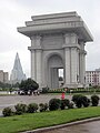Triumphal Arch and Ryugyong Hotel, Pyongyang.jpg