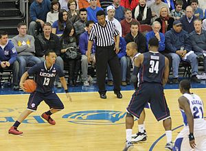 Napier dribbling around a pick and roll play setup by teammate Alex Oriakhi. UConn's Shabazz Napier.jpg