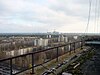 The power plant as seen from an abandoned apartment block in Pripyat.