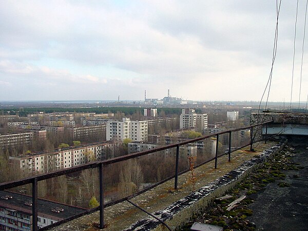 The abandoned city of Pripyat, Ukraine, following the Chernobyl disaster. The Chernobyl nuclear power plant is in the background.