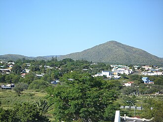 The same skyline in 2011, showing the Old Location Cemetery Museum (lower right corner) and parts of the suburb Pionierspark Windhoek, Hochland Park.jpg