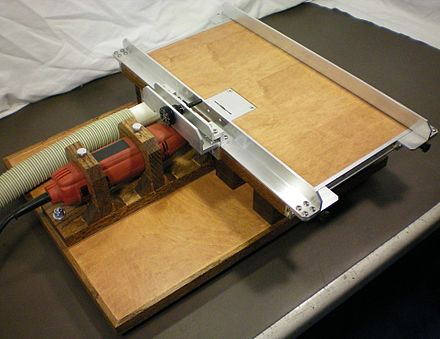 A 1-inch (25 mm) micro table saw.