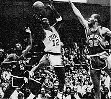 Nate Kilbert (left) and Joe McKinley defend against Duke's David Henderson in the 1986 NCAA tournament. 1986 Duke v Mississippi Valley State - Nate Kilbert, David Henderson, Joe McKinley.jpg