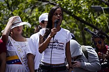 Marvinia Jimenez, a woman who was beaten by Venezuelan police officers, speaks at the 24 June rally. 24 June 2014 Venezuelan protests Marvinia Jimenez.jpg