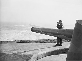 A gunner of 508th (Tynemouth) Coast Regiment keeps watch at the 9.2 inch gun coastal defence battery at Castle Priory, Tynemouth, 28 November 1940 (IWM H5799) A gunner keeps watch at the 9.2 inch gun coastal defence battery at Castle Priory, Tynemouth, 28 November 1940. H5799.jpg