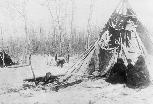 Dane-zaa (Beaver) tipi in winter near Peace River, Alberta, 1899