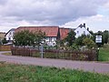 Residential stable house, barn and two side buildings of a four-sided courtyard with remains of the courtyard paving (including Göpelring)