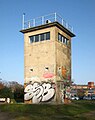 DDR- Schlesischer Busch: star mejni opazovalni stolp ob Berlinskem zidu