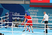 Deutsch: Boxen bei den Olympischen Jugendspielen 2018 Tag 12, 18. Oktober 2018 - Kampf um die Bronzemedaille im Fliegengewicht Mädchen – Timur Merjanow (Usbekistan, rot) schlägt Youssef Ali Karar Ali (Ägypten, blau) 5-0; Ringrichter ist Antonín Gaspar (Tschechien). English: Boxing at the 2018 Summer Youth Olympics on 18 October 2018 – Boy's heavyweight Bronze Medal Bout - Timur Merjanov (Uzbekistan, red) beats Youssef Ali Karar Ali (Egypt, blue) 5-0; Referee is Antonín Gaspar (Czech Republic). Español: Boxeo en los Juegos Olímpicos Juveniles de Verano de 2018 en 18 de octubre de 2018 - Medalla de bronce de peso pesado del muchacho: Timur Merjanov (Uzbekistán, roja) le gana a Youssef Ali Karar Ali (Egipto, azul) 5-0; El árbitro es Antonín Gaspar (Republica checa).