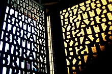 The British Library entrance gate and shadow. British Library Gate Shadow.jpg