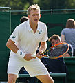 Brydan Klein competing in the first round of the 2015 Wimbledon Doubles Qualifying Tournament with David Rice at the Bank of England Sports Grounds in Roehampton, England. The winners of two rounds of competition qualify for the main draw of Wimbledon the following week.