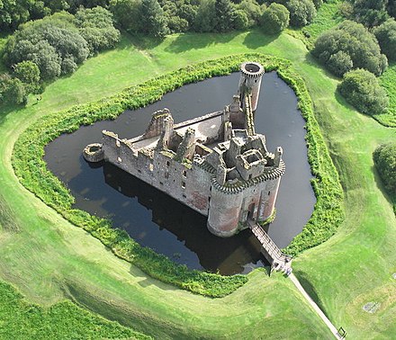 Caerlaverock Castle in Scotland is surrounded by a moat.