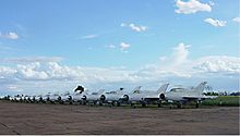 Lineup of 14 Cambodian Air Force MiG-21bis and one MiG-21U Cambodian Air Force MiG-21 Nathalie.jpg