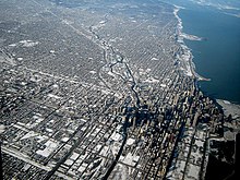 An aerial view of a human ecosystem. Pictured is the city of Chicago. Chicago Downtown Aerial View.jpg